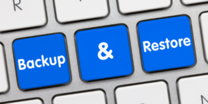 Image of keyboard keys saying "Back up & restore" - restoring and backing up data can improve your computer security - Call IT Services Brisbane today