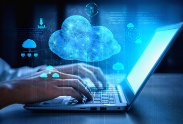 Cropped image of a person using a laptop, cloud computing concept